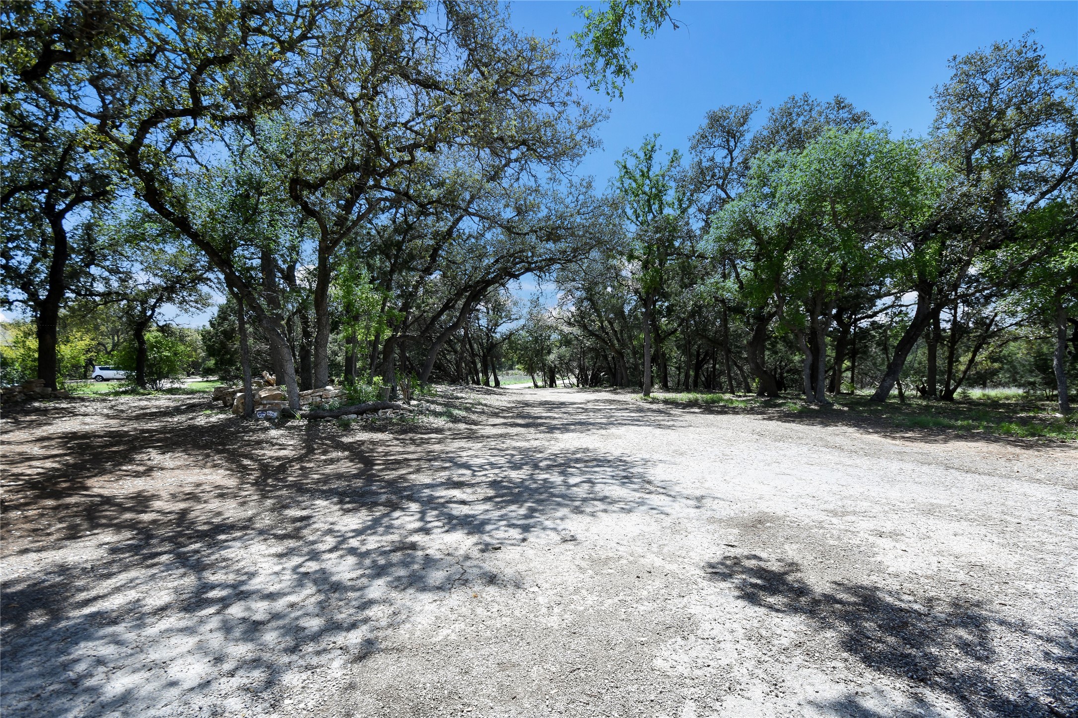 17800 Edgewood Way, Unit 203 Jonestown, TX 78645 - Photo 25 of 40 a view of outdoor space with trees