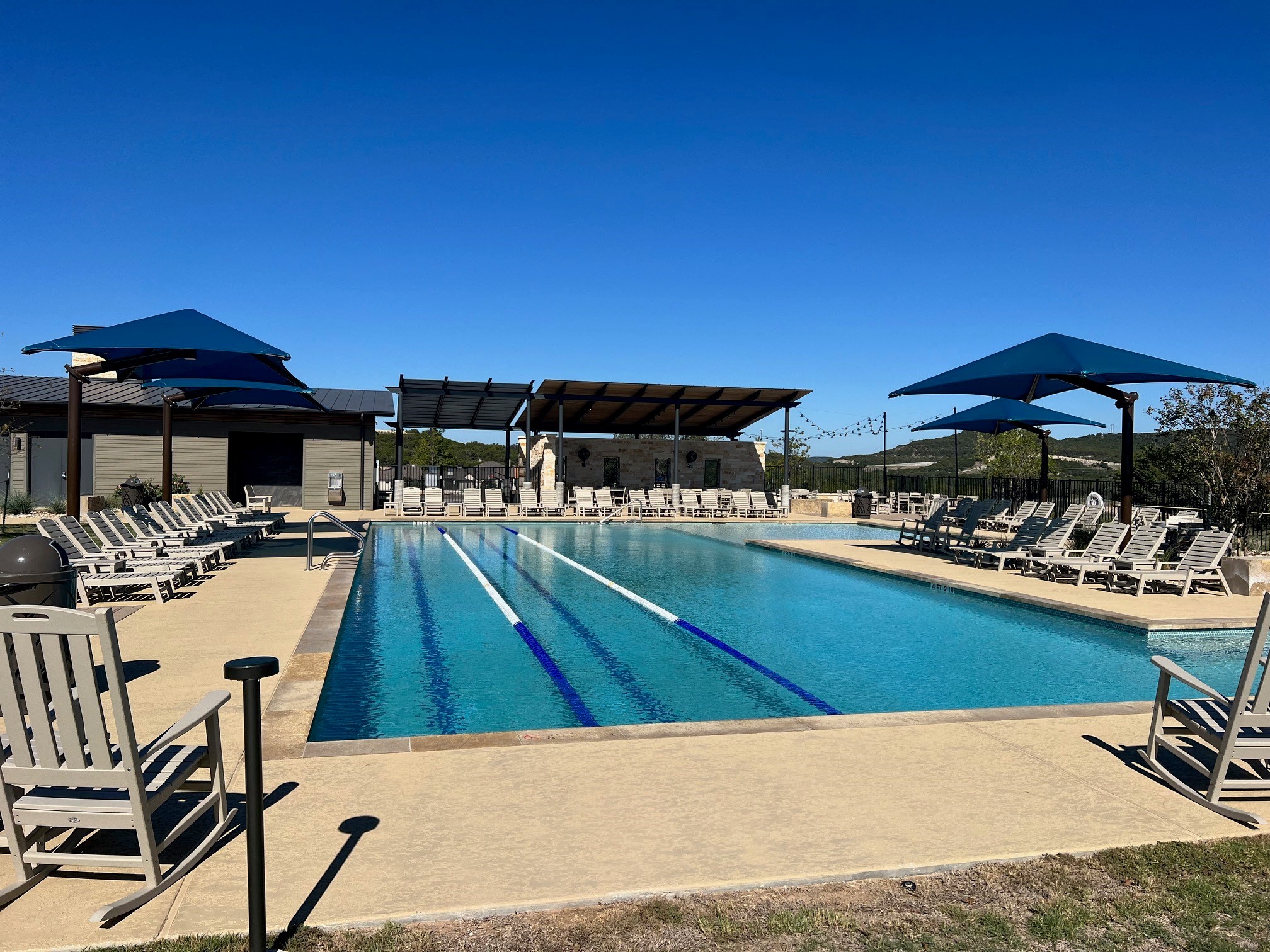 17800 Edgewood Way, Unit 203 Jonestown, TX 78645 - Photo 37 of 40 a view of swimming pool with outdoor seating