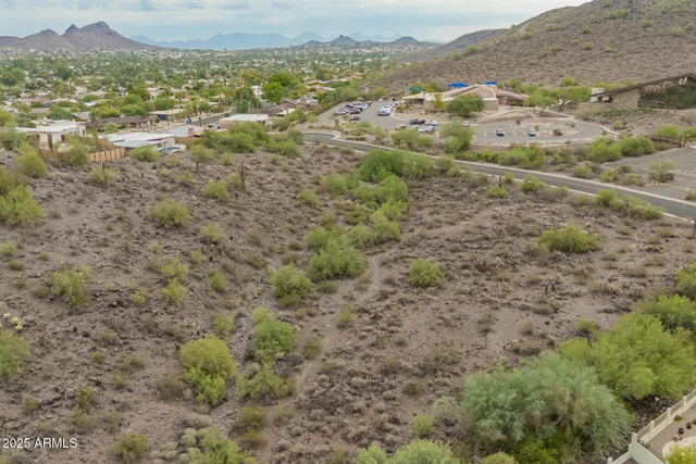 a view of a city with mountain