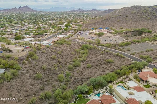 an aerial view of residential house and outdoor space