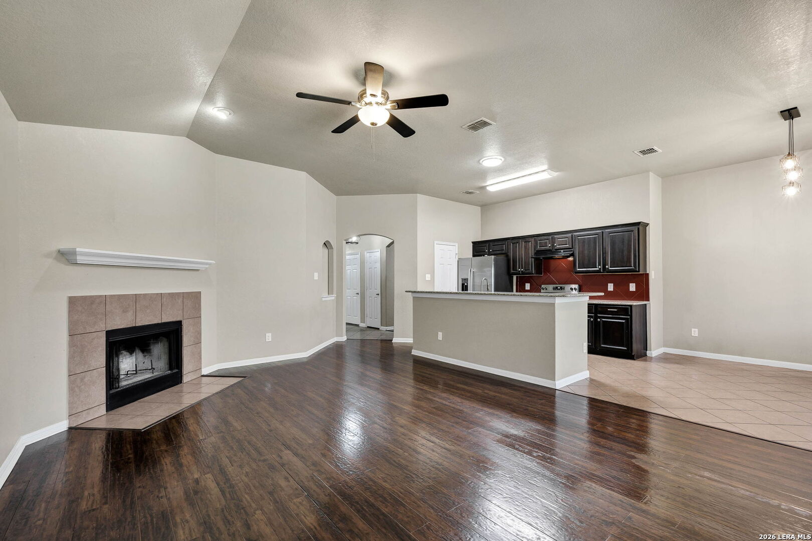 4015 Shervin Way Converse, TX 78109 - Photo 11 of 43 a view of kitchen with microwave and wooden floor