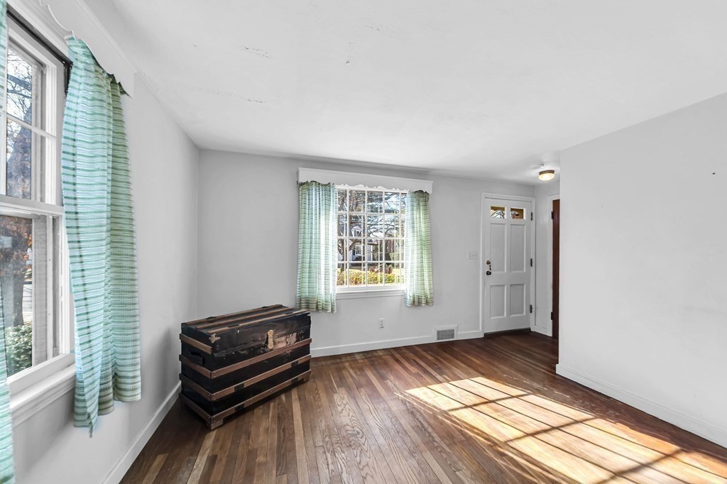 14 Franconia Street Springfield, MA 01108 - Photo 11 of 27 a view of a room with wooden floor and windows