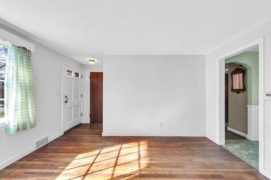 14 Franconia Street Springfield, MA 01108 - Photo 12 of 27 a view of a big room with wooden floor and windows