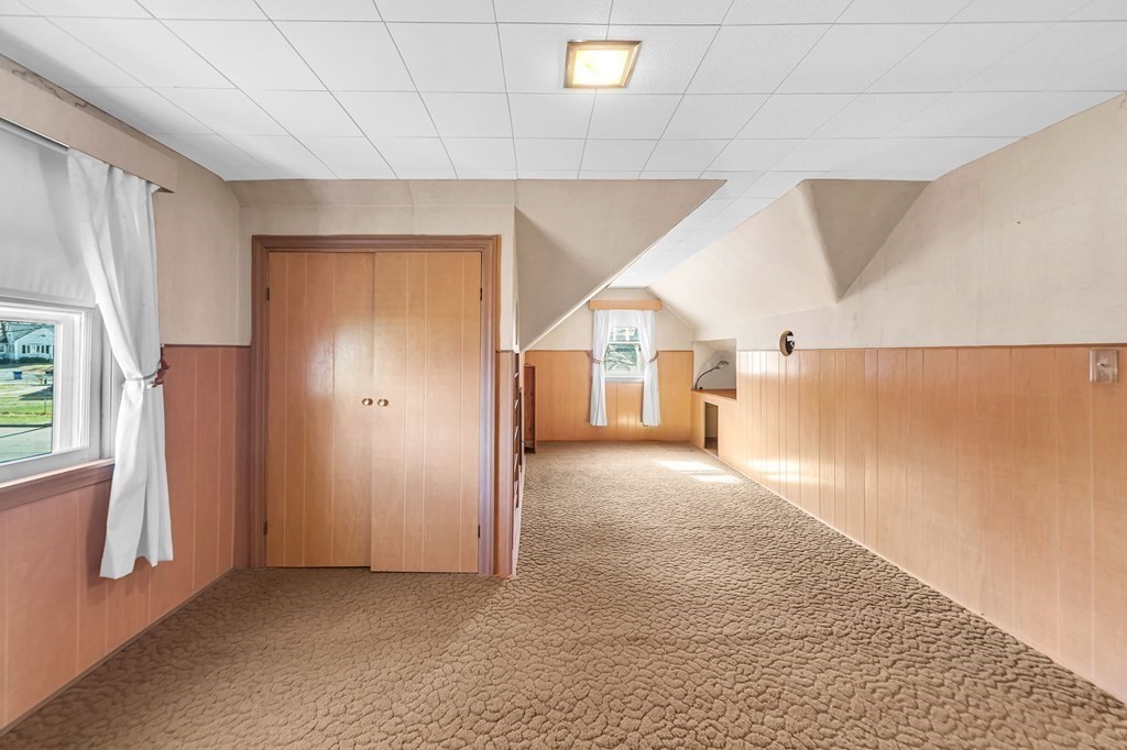 14 Franconia Street Springfield, MA 01108 - Photo 19 of 27 a view of a hallway with windows
