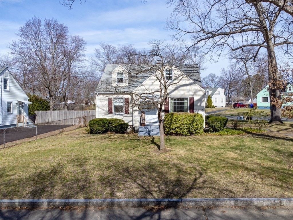 14 Franconia Street Springfield, MA 01108 - Photo 2 of 27 a view of a house with a yard covered in snow