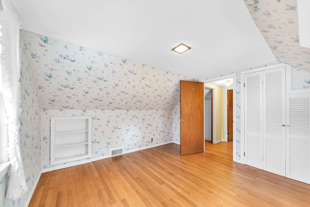 14 Franconia Street Springfield, MA 01108 - Photo 22 of 27 wooden floor in an empty room