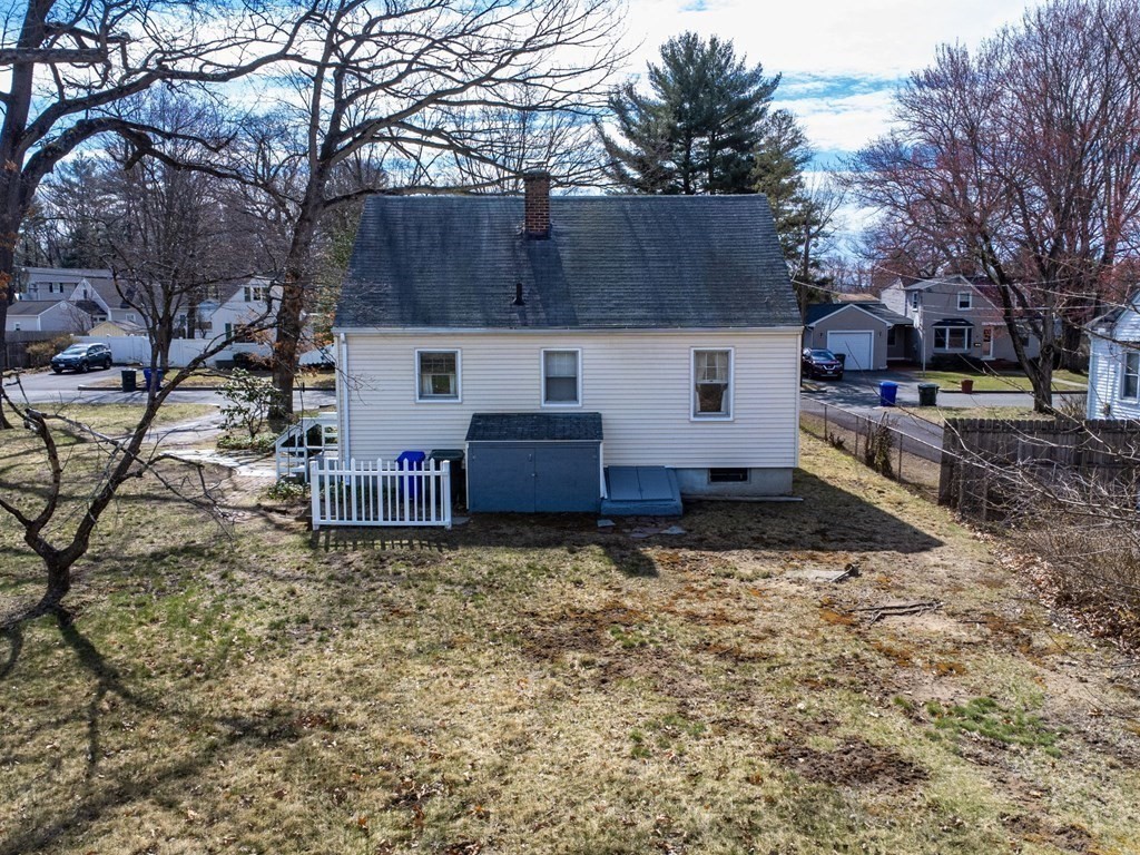 14 Franconia Street Springfield, MA 01108 - Photo 4 of 27 a view of a house with a yard and trees