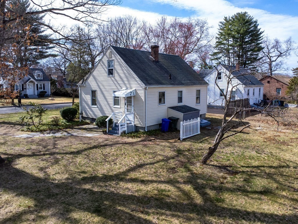 14 Franconia Street Springfield, MA 01108 - Photo 5 of 27 a view of a house with a yard covered in snow