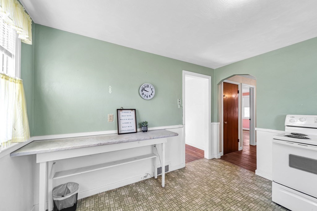 14 Franconia Street Springfield, MA 01108 - Photo 7 of 27 a bedroom with a bed and a dresser