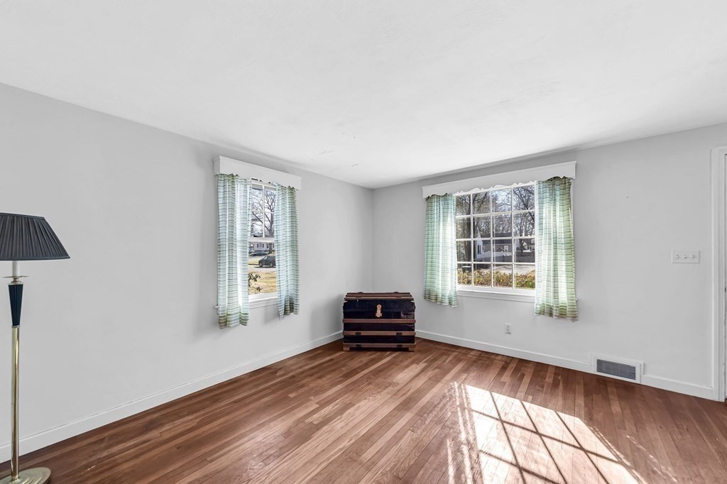 14 Franconia Street Springfield, MA 01108 - Photo 10 of 27 a living room with furniture and a window
