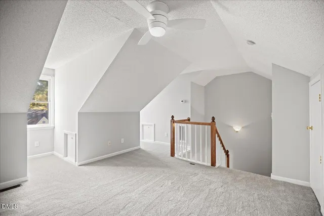 a view of a patio with wooden floor and roof
