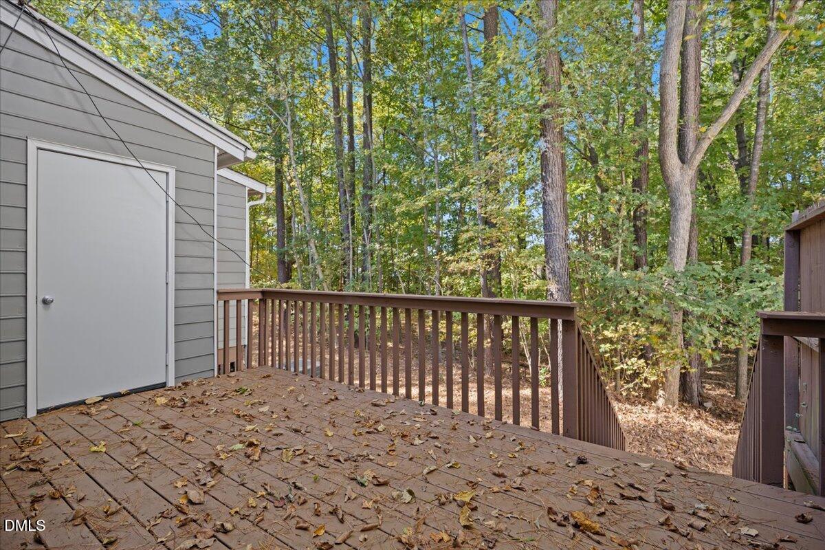 6063 Epping Forest Drive Raleigh, NC 27613 - Photo 30 of 34 a view of a wooden fence