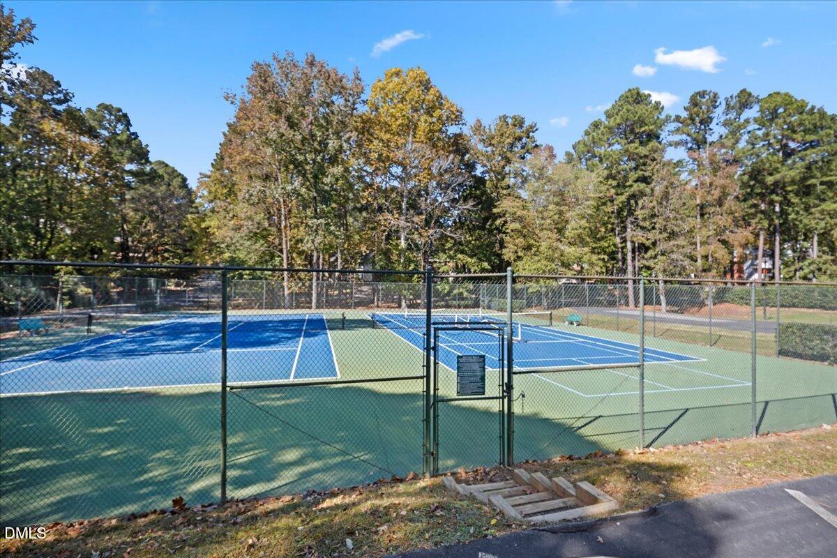 6063 Epping Forest Drive Raleigh, NC 27613 - Photo 31 of 34 a view of a tennis court