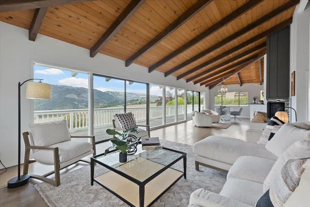 a kitchen with cabinets and wooden floor