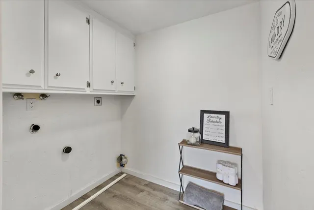 a view of deck with wooden floor and fence with a trees