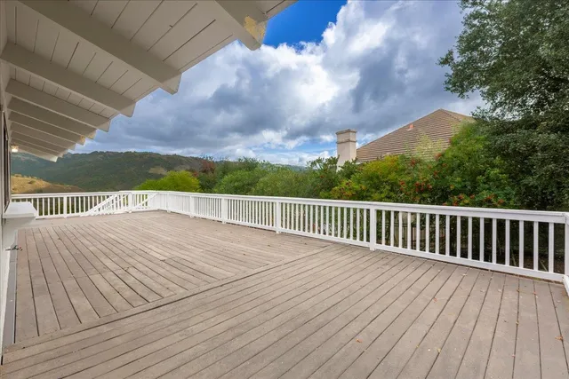 an aerial view of residential house with an outdoor space