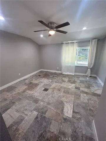 a bathroom with a sink toilet a mirror and bathtub