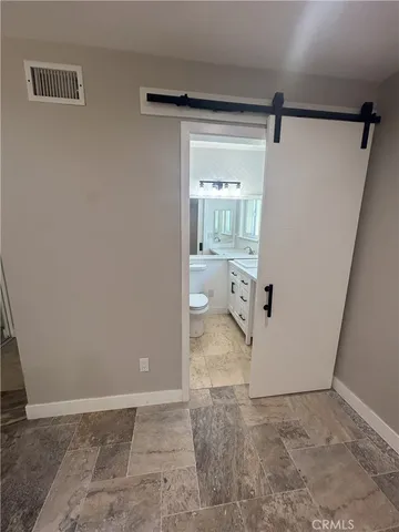 wooden floor in a en suite bathroom