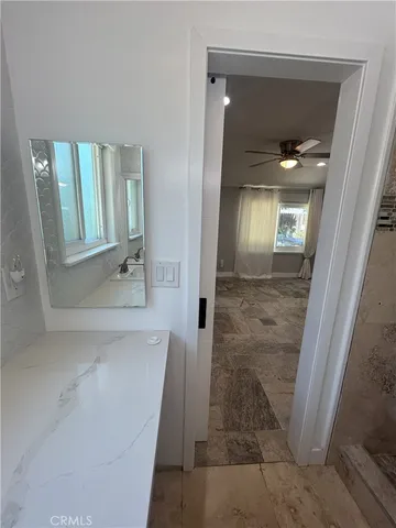 a view of a kitchen with a sink