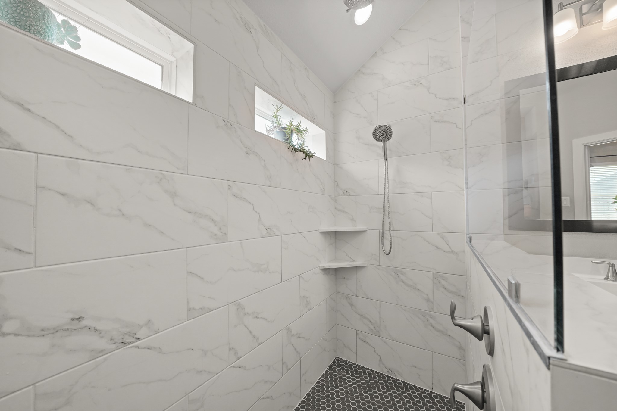 6635 Waxbill Road Katy, TX 77493 - Photo 18 of 33 a bathroom with a shower