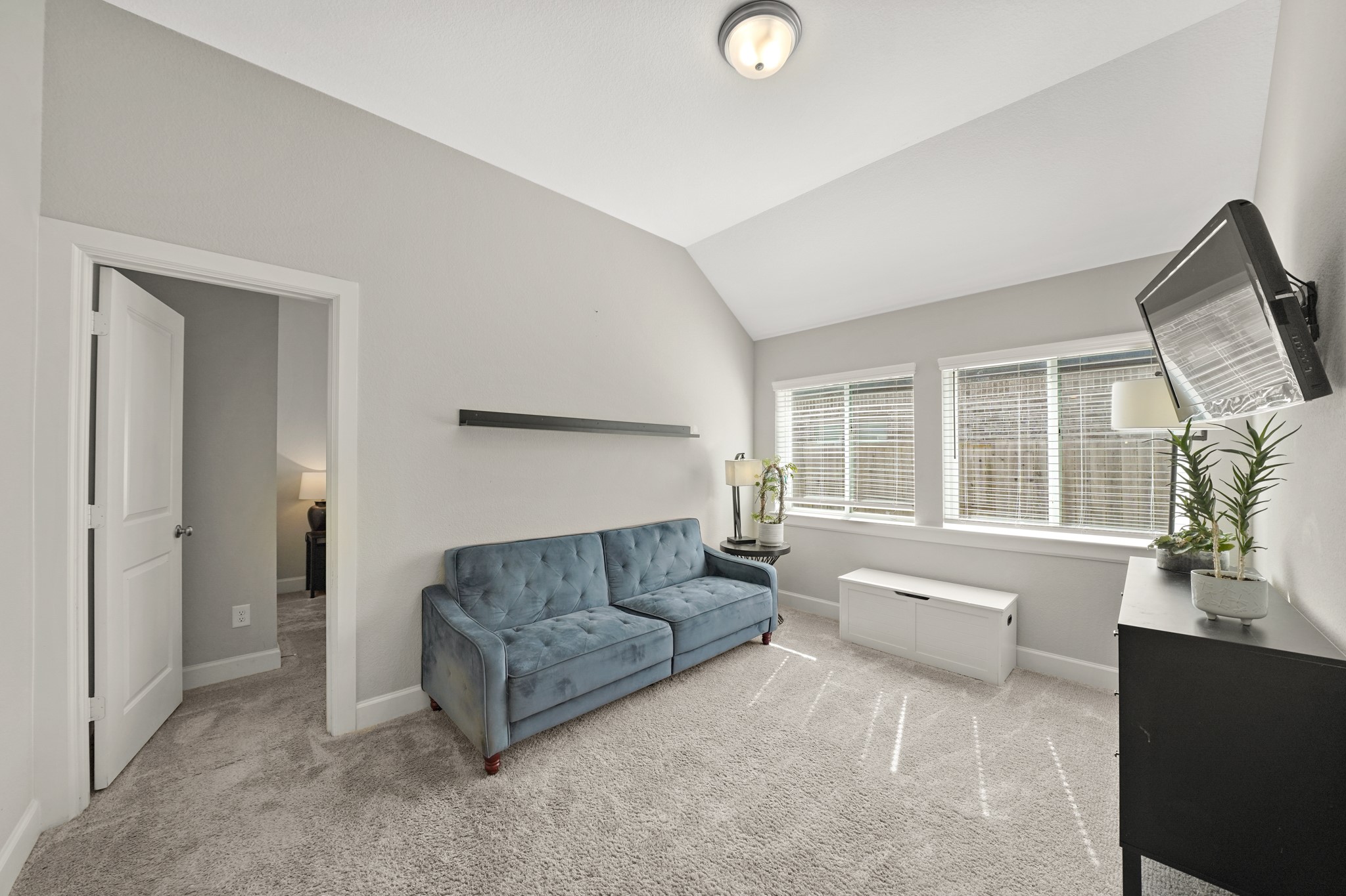 6635 Waxbill Road Katy, TX 77493 - Photo 19 of 33 a living room with furniture and a large window