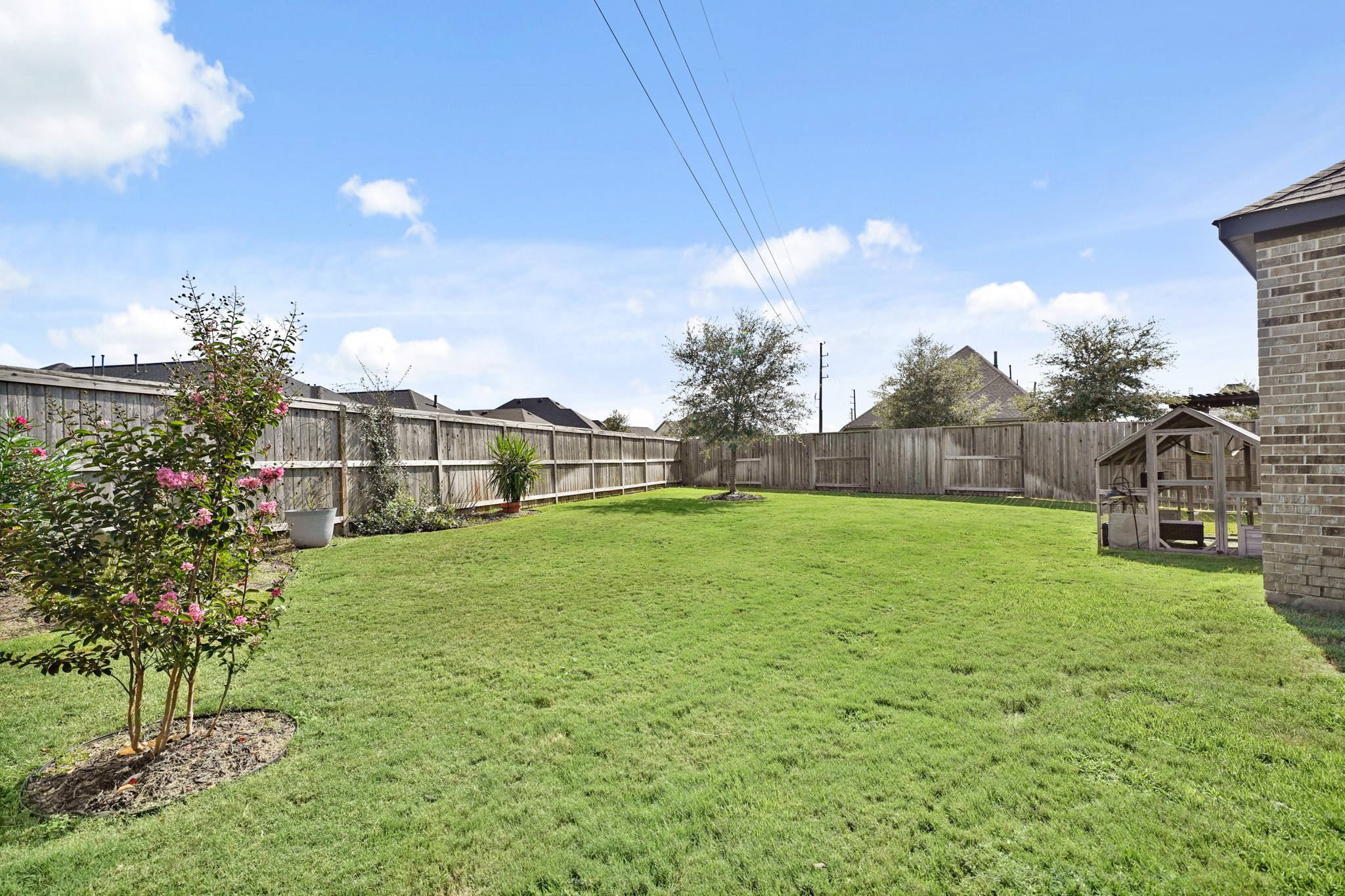 6635 Waxbill Road Katy, TX 77493 - Photo 26 of 33 a view of a garden