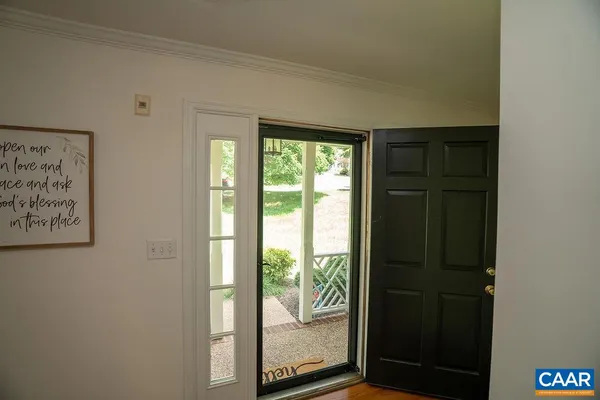 a kitchen with stainless steel appliances granite countertop a stove a sink and a wooden cabinets