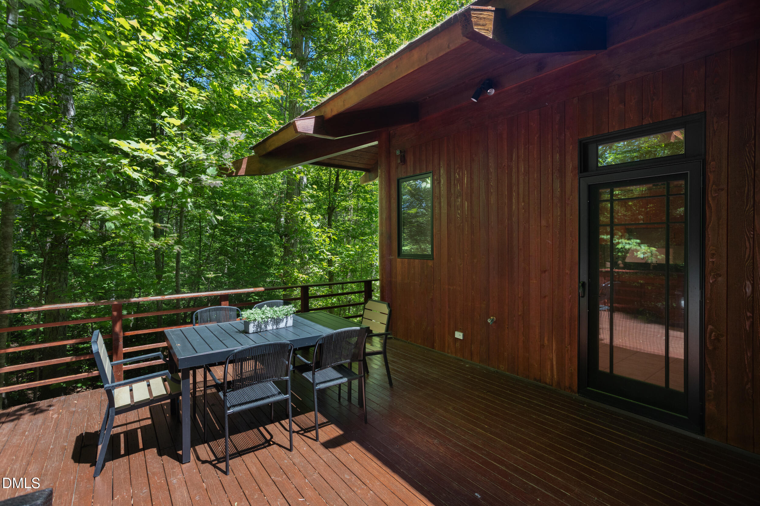 260 Bc Way Rougemont, NC 27572 - Photo 32 of 76 a view of balcony with wooden floor and outdoor seating
