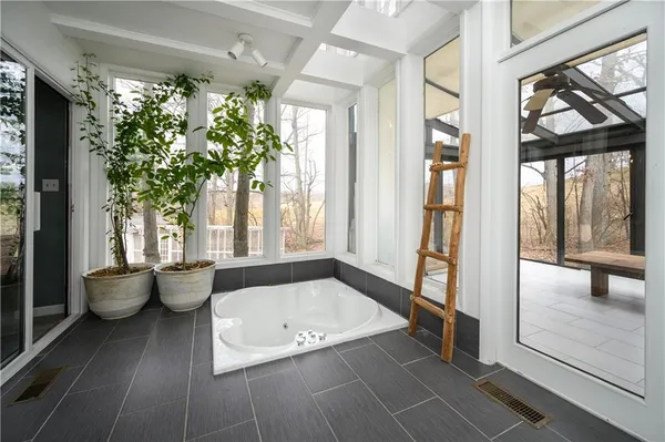 a view of an empty room and window