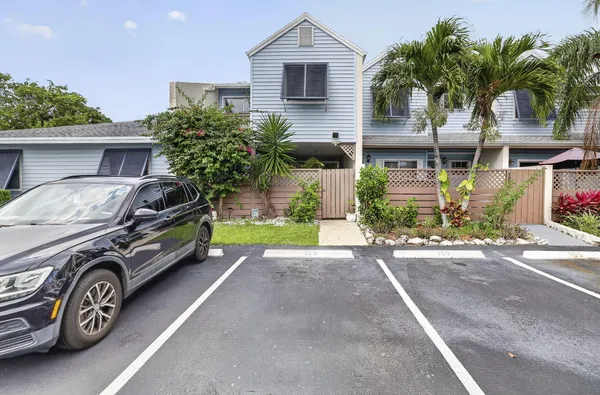 a car parked in front of a house