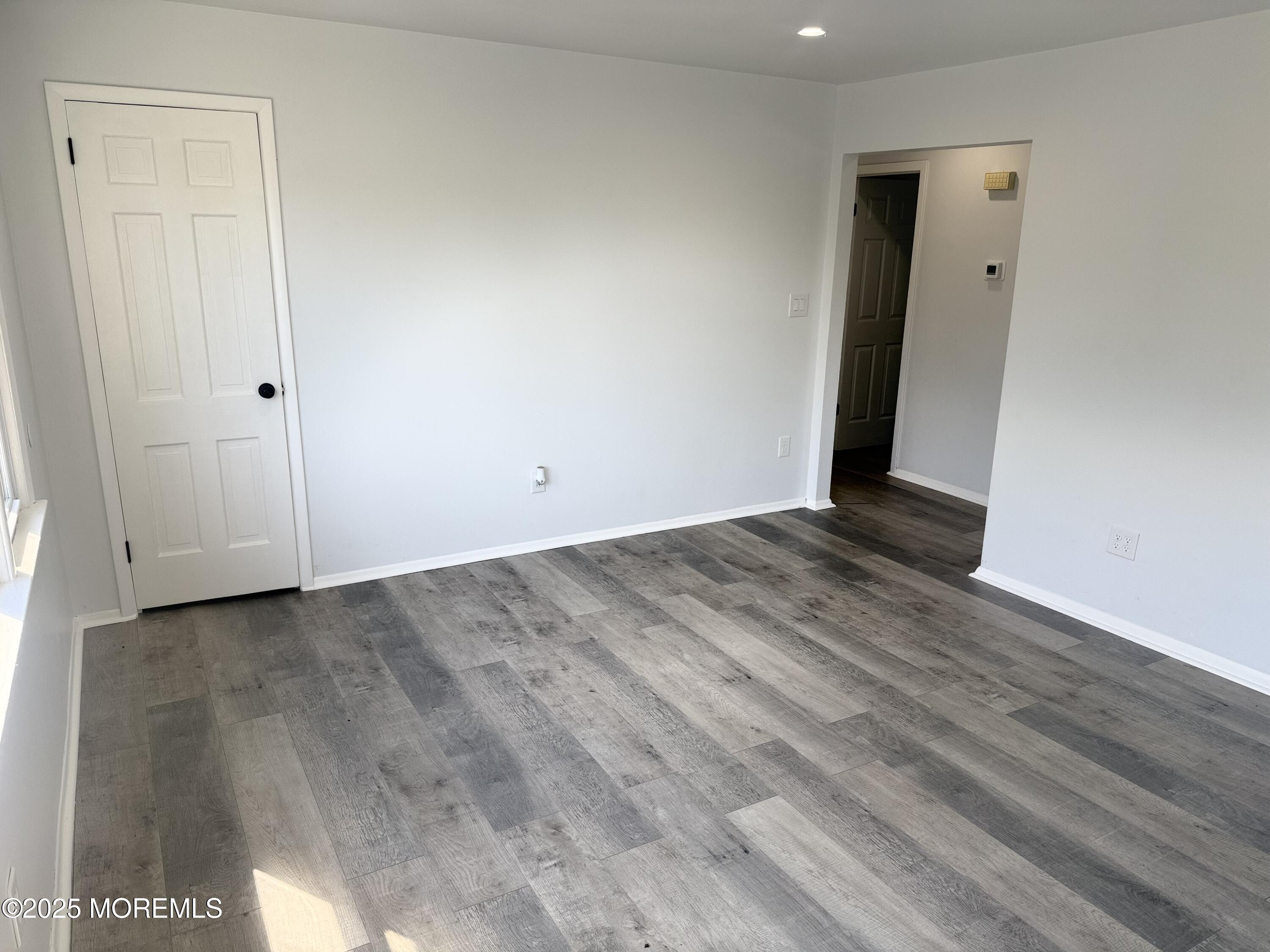 55 Chapin Avenue, Unit 2 Red Bank, NJ 07701 - Photo 4 of 13 a view of an empty room