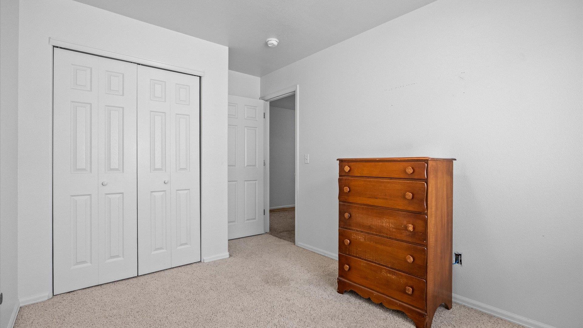420-29 29 1/2 Road Grand Junction, CO 81504 - Photo 19 of 26 an empty room with closet and dresser
