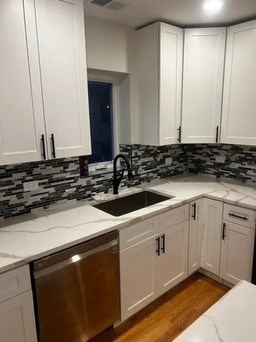 a view of a kitchen sink