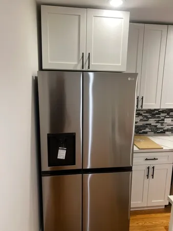 a close view of a refrigerator in kitchen