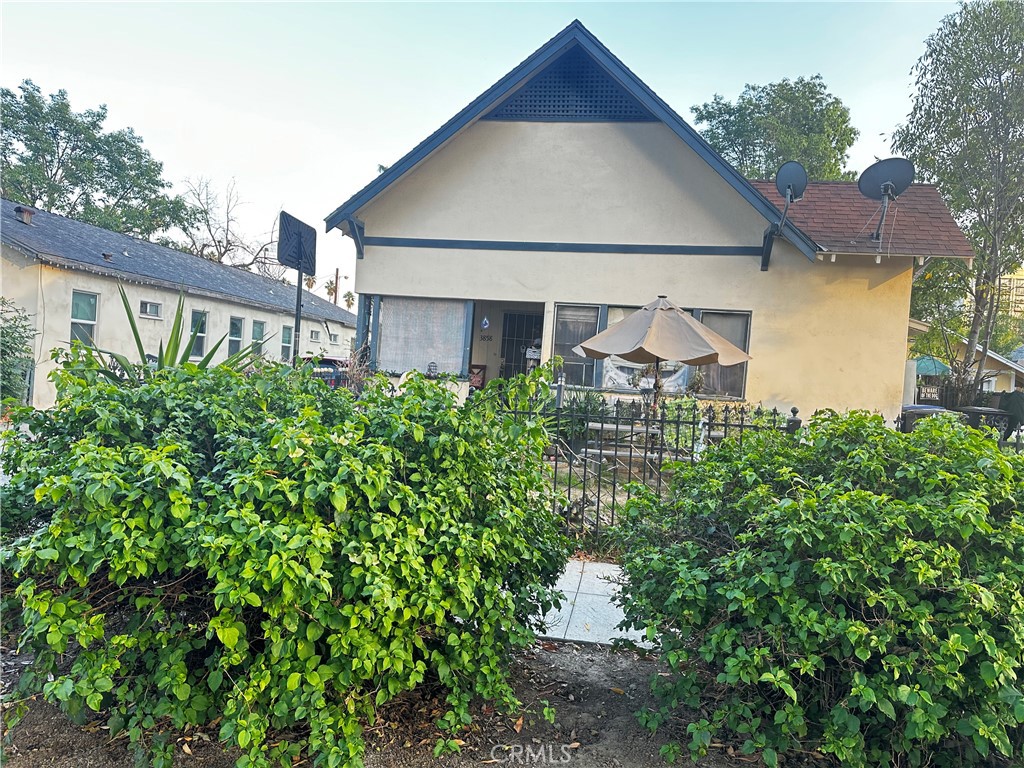 a house view with a garden space