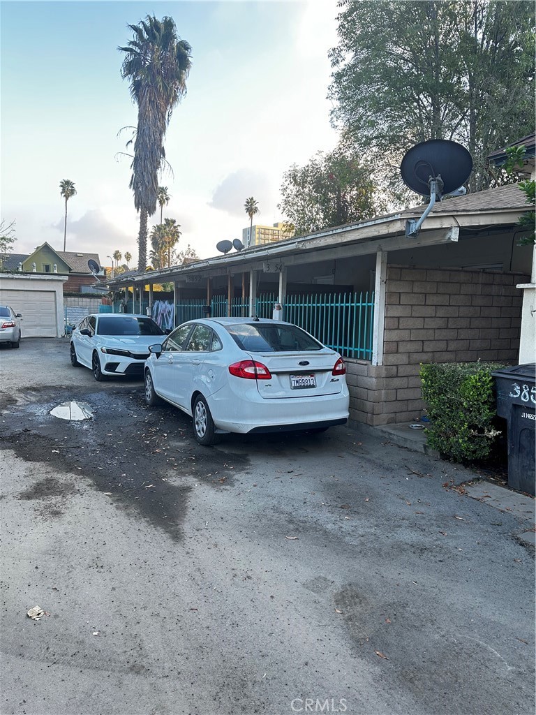 3848 Locust Street Riverside, CA 92501 - Photo 4 of 6 a car parked in the parking space