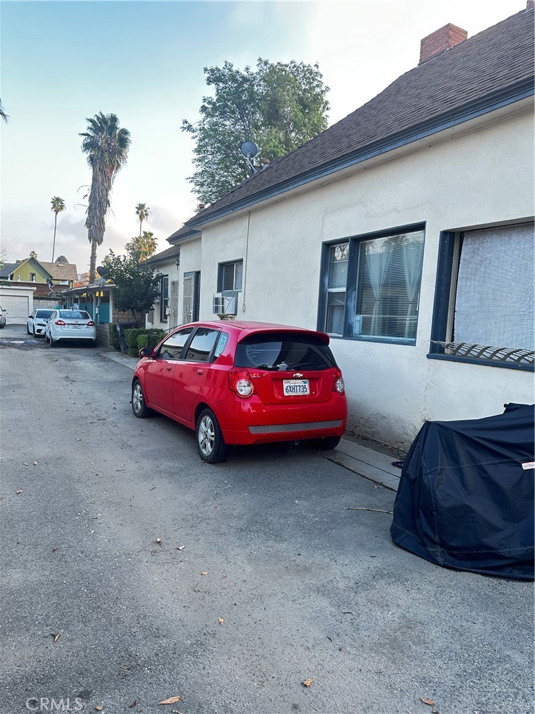 3848 Locust Street Riverside, CA 92501 - Photo 5 of 6 a car parked in front of a house