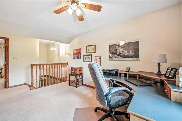 a view of a workspace with furniture