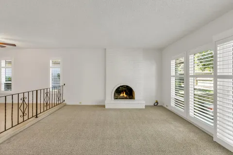 a view of a livingroom with a staircase