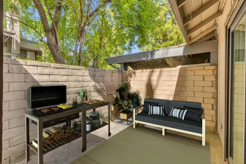 a view of a bench in the patio