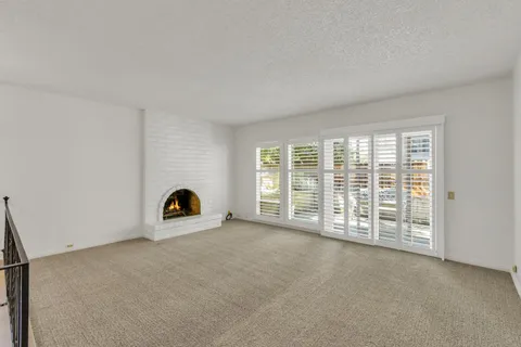 a view of a livingroom with a large window