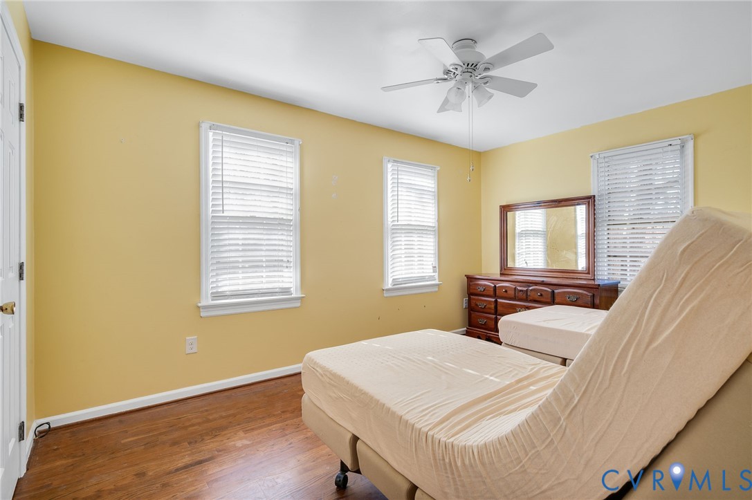 8994 Becton Road Glen Allen, VA 23060 - Photo 25 of 29 Bedroom with wood finished floors and ceiling fan