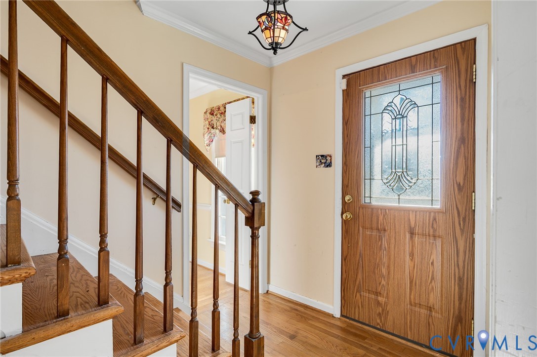 8994 Becton Road Glen Allen, VA 23060 - Photo 5 of 29 Entryway featuring wood-type flooring, crown moldi
