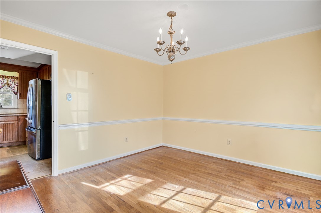 8994 Becton Road Glen Allen, VA 23060 - Photo 9 of 29 Formal dining room featuring a chandelier, light w
