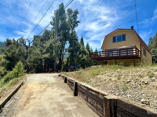 a view of a backyard with a patio