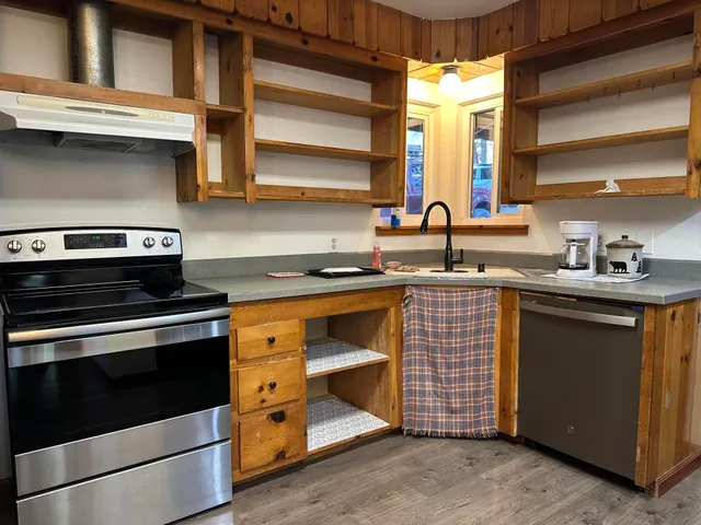 a view of balcony with couch and trees