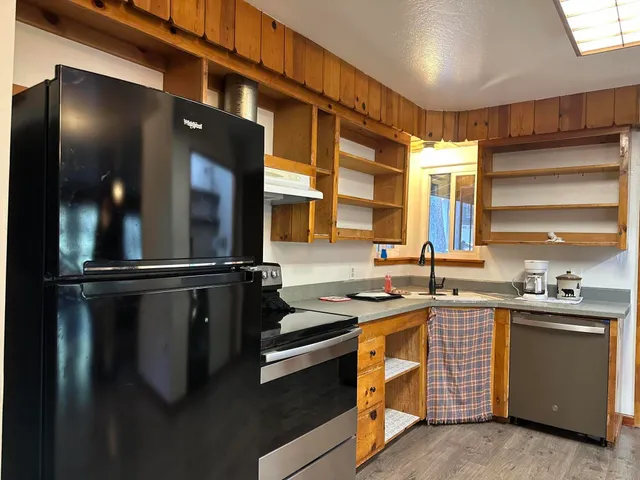 a view of balcony with wooden floor