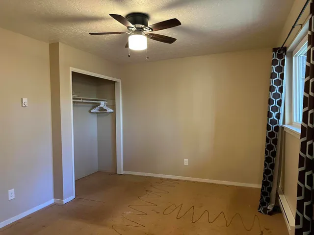 a view of backyard with green space