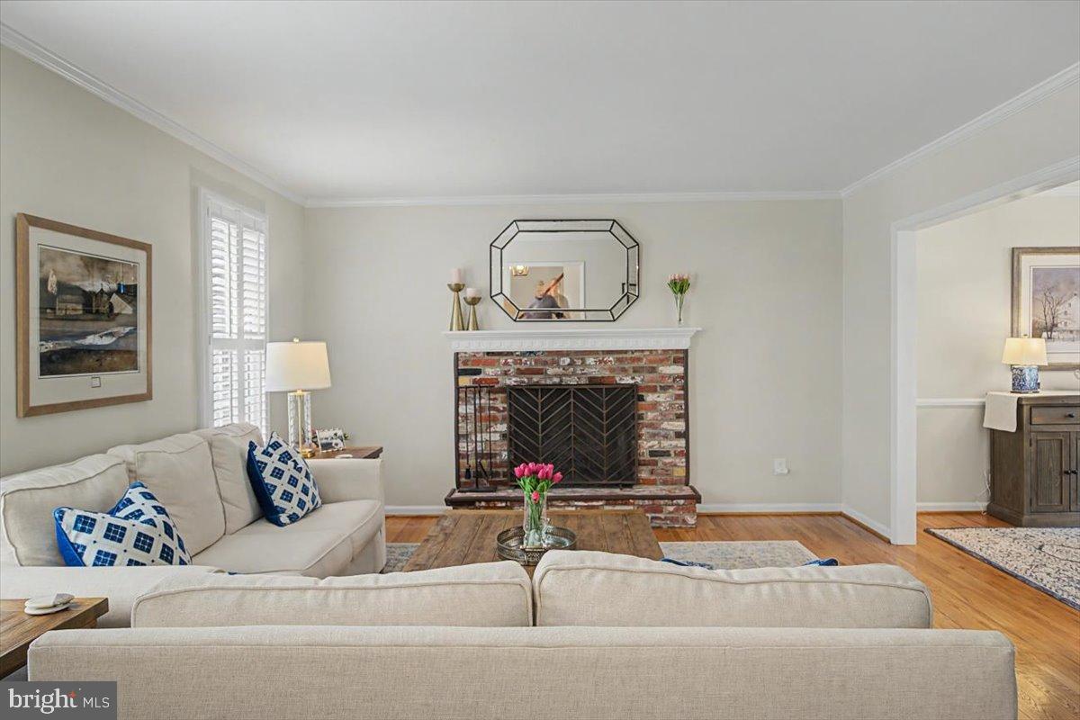 6 Briar Road Wilmington, DE 19803 - Photo 4 of 29 Plantation shutters and brick fireplace