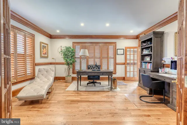 a kitchen with granite countertop a sink a counter space appliances and cabinets